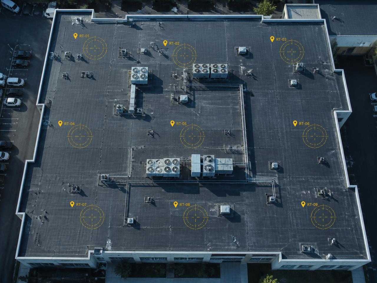 Aerial commercial roof capture with visible observations pinned across the surface